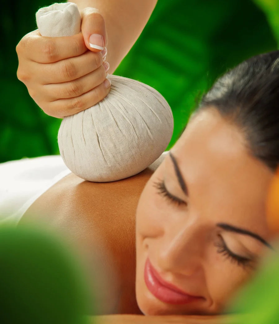 Thai herbal compress massage for upper body / whole body